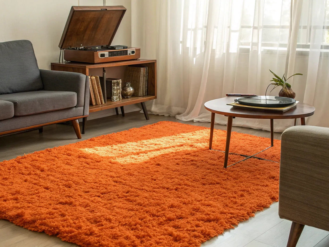 A vibrant orange 70s shag rug styled in a modern living room with mid-century furniture.